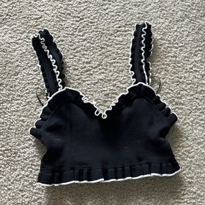 Small black shirt w/ ruffles